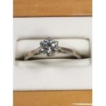 An 18ct gold solitaire diamond ring (approx. .33 points).