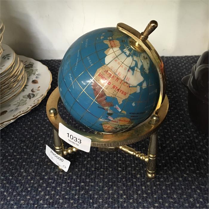 A brass globe.