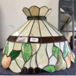 A Tiffany style lamp shade.