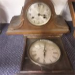 Two wooden mantle clocks.