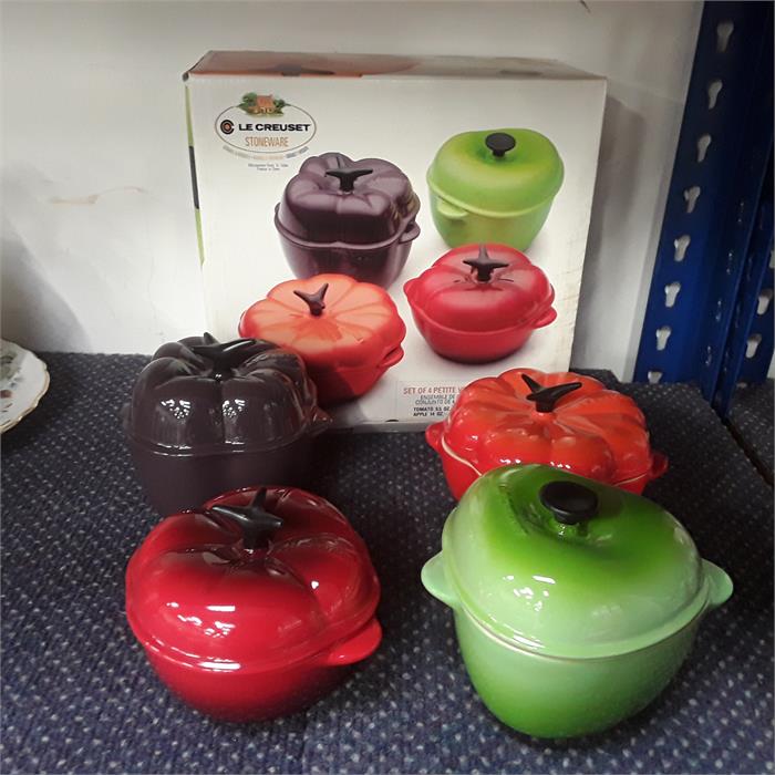 A boxed Le Creuset stoneware set of 4 petite vegetable casserole dishes.