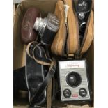 A collection of vintage cameras, camcorder, brownie etc.