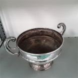 A silver plated tennis tournaments inscribed twin handled vase.