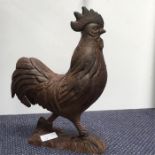 A cast iron cockerel