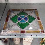 A square stained glass panel.