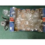 A box of various wine glasses, decanters etc