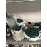 A collection of Denby green wheat china.