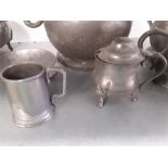 A collection of various pewter.warming dish, tankards, hens. bowls etc