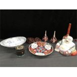 A collection of oriental items including bottle vases a cloisonné lidded container and other items.