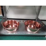 Two antique copper jam pans.