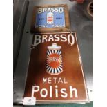 Two Brasso Metal Polish enamel signs.