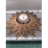 A mid 20th century Metamec sunburst wall clock.