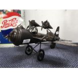 A metal model of a plane.