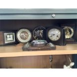 Six mantle clocks.