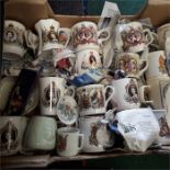 A box containing a quantity of Royal commemorative mugs etc.