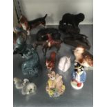 Collection of animal ornaments including Poole Pottery, Coalport, Beswick.