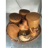 A quantity of ethnic wicker, wooden treen items.