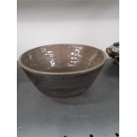 A brown and floral splash decorated Leach or St Ives Pottery ? bowl.