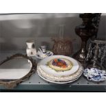 A Clarice Cliff 'Gay Day' Bizarre pattern plate together with an oil lamp, mirror and other china.