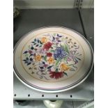 A 13.5 inch Poole Pottery charger in traditional pattern.