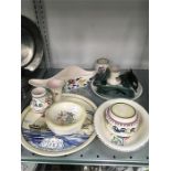 A collection of Poole Pottery. inc Tito Durell built 1746 in Poole charger various dishes. plates