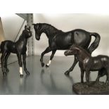 Two Beswick horses black stallion white front sock and one horse ornament from Dartmoor.