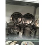 A large quantity of pewter items.inc queen Ann design ewer, tavern plates/ charges, mugs, box, etc