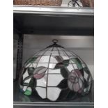 A Tiffany style lamp shade (af).