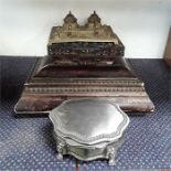 A studded box, a metal safety box, a pewter trinket box together with a brass inkwell.