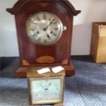 Two wooden cased clocks.