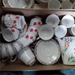 Two boxes containing the residue of various tea sets Royal Doulton Arlington, Arklow and Clay