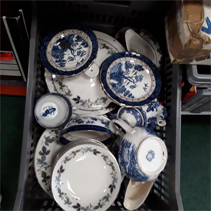 The residue of two tea/dinner service's Royal Doulton burgundy and blue and white.