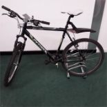 A Python mountain bike. 21 speed with front suspension and a rear mudguard. Some scratches but