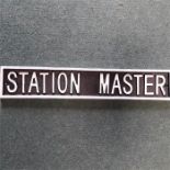 A Stationmaster sign.