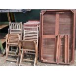 A table with various garden chairs.