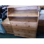 A pine baby changing unit of three drawers together with a bedside cabinets.