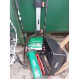 A Qualcast push mower with a Brill push mower.