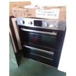 An in built oven with separate hob.