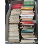 A box of vintage ordnance survey maps.