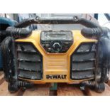 A Dewalt works radio and charger.(17).