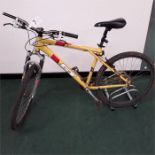 A GT mountain bike. 18 speed with front suspension. Condition poor. (R71)