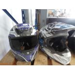 Two motorcycle helmets.