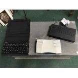 Two digi boxes with a Kensington tablet keyboard.