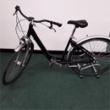 A Topbike city 500 ladies bike. Three speed with mudguards, a stand and lock. Mixed tyres, in good