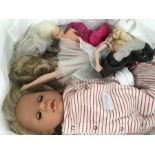 A number of dolls, including Cindy