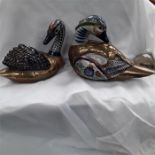 Two brass and ceramic ducks.
