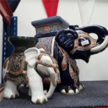 A large and small ceramic elephant planters.