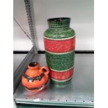 Two West German vases, one in green and orange.