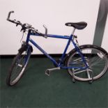 A Raleigh bike. 21 speed with mudguards. Tyres have deteriorated, but in general good condition (