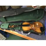 Two violins, condition as found.